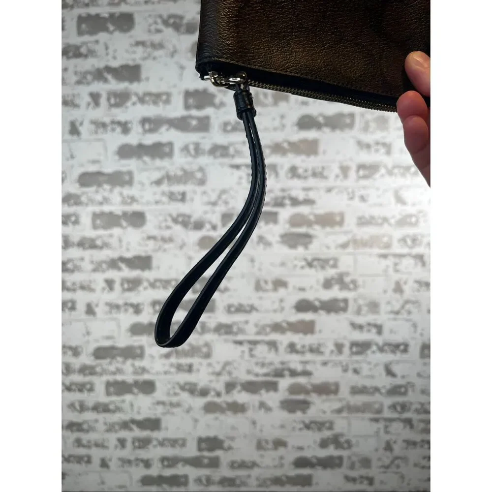 Coach | leather wristlet with strap